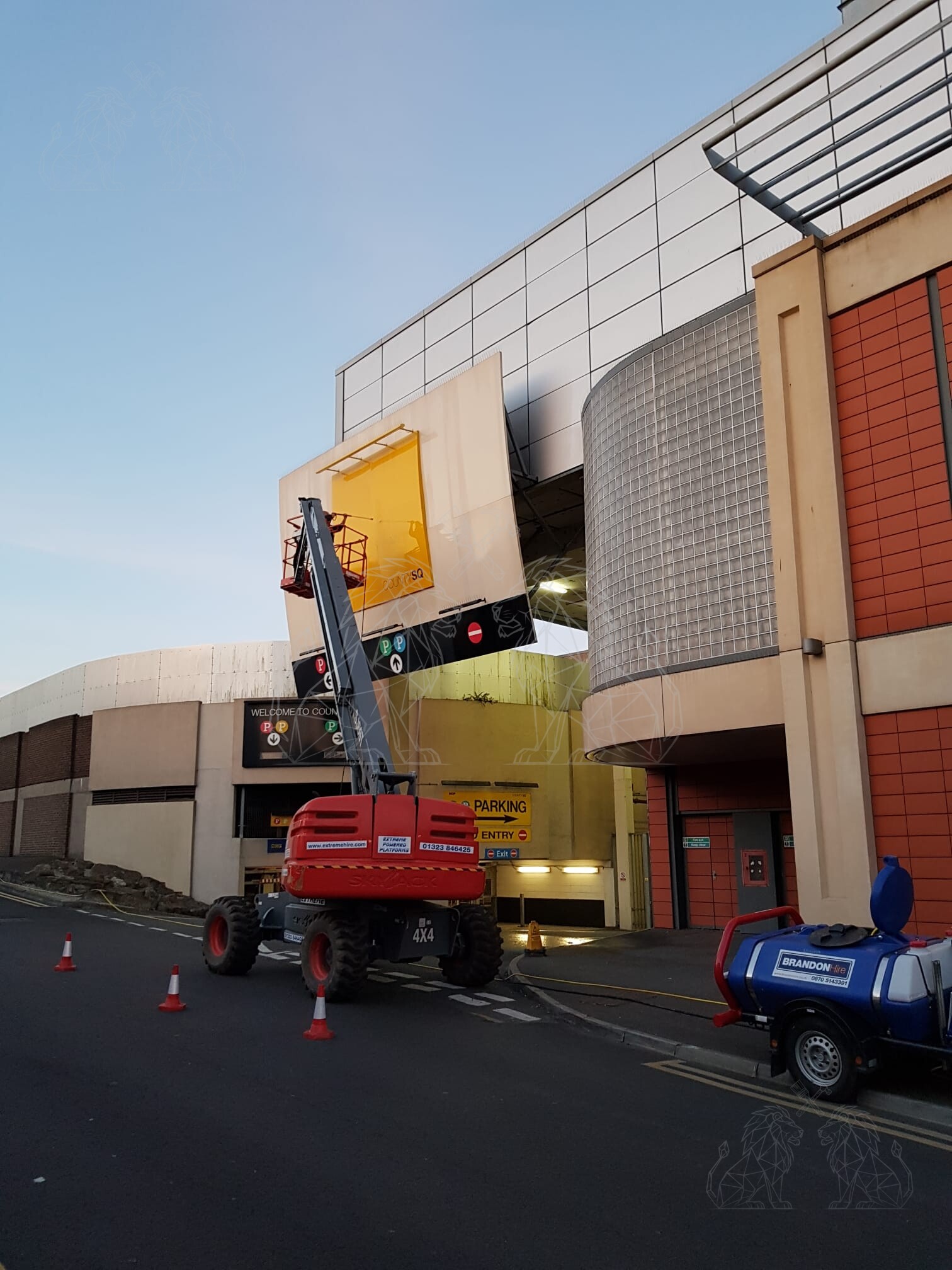 Large MEWP providing access to a shopping centre exterior